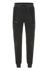 Dark gray jogger pants made of soft fabric featuring black side pockets, a drawstring waist, and ribbed cuffs at the ankles.