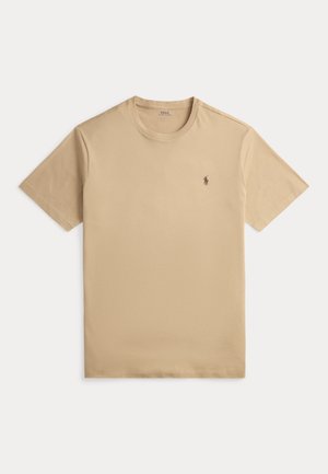 Beigefarbenes T-Shirt mit kurzen Ärmeln und Rundhalsausschnitt, mit kleinem besticktem Polo Ralph Lauren-Logo auf der linken Brust.