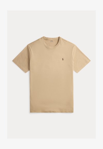 Beigefarbenes T-Shirt mit kurzen Ärmeln und Rundhalsausschnitt, mit kleinem besticktem Polo Ralph Lauren-Logo auf der linken Brust.
