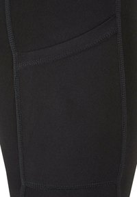 Leggings sportivi neri con una trama liscia, dotati di una tasca laterale e cuciture a contrasto lungo le cuciture per un tocco di dettaglio in più.