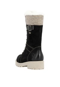 Black suede and leather knee-high boot with a grey fabric cuff, white faux fur lining, side buckle, and textured white sole.