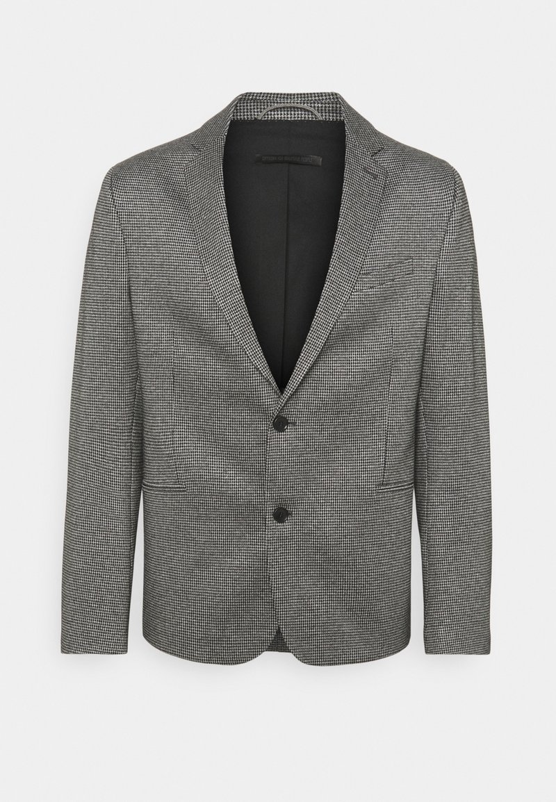 Blazer s vzorem houndstooth v černé a bílé barvě, s dvouknoflíkovým zapínáním, klopovými límci a dvěma předními kapsami. Hladká textura.