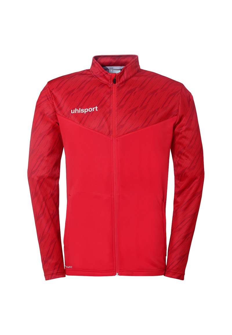Rød sportsjakke, fuld lynlås, lavet af letvægtsmateriale. Har teksturerede mønstre på skuldrene, hvidt logo på venstre bryst, lange ærmer.