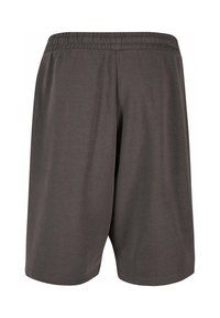 Gray athletic shorts made of soft fabric. Elastic waistband for comfort. Simple design, with no visible patterns or accents.