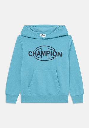 Sudadera con capucha de color azul claro, con un bolsillo frontal y un logotipo negro de "CHAMPION". Fabricada con tela suave y con puños y dobladillo acanalados.