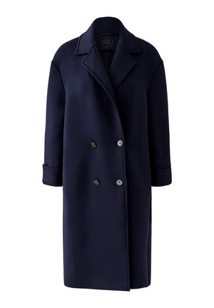 Marineblauwe dubbelrijige lange jas met inkeping in de revers en omgeslagen manchetten, weergegeven op een witte achtergrond.
