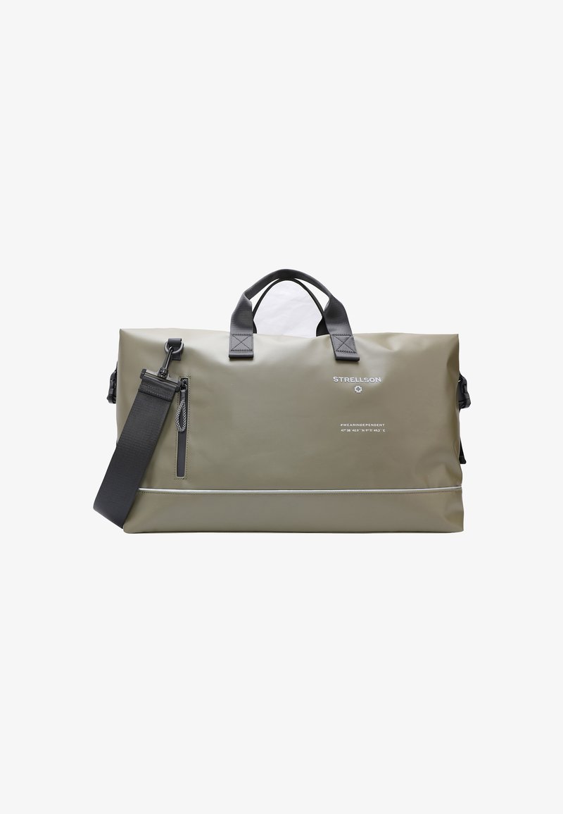 Olivengrønt duffelbag lavet af vandtæt materiale; har sorte stropper, en lynlåslomme og en reflekterende strip langs bunden.