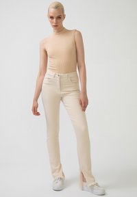 Touché Privé Nadrágok - beige