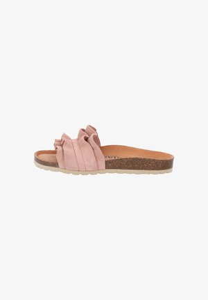 Slip-on sandal with a light pink suede upper featuring ruffles, natural cork midsole, and textured rubber outsole for grip.