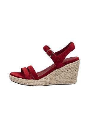 Red suede wedge sandal with woven espadrille heel, two front straps, and an ankle strap with a gold buckle.