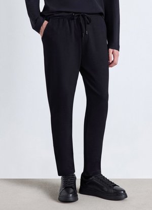 Calliope, PANTALONE GINNICO TINTA UNITA - Pantaloni sportivi - nero ultrablack
