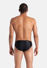 Arena OPENINGS - Costume da bagno a slip - black-turquoise