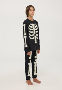 Terranova SET CON SCHELETRO CHE SI ILLUMINA - Pigiama - nero