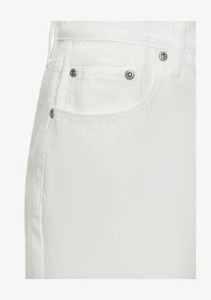 White denim jeans feature a close-up of the back pocket with silver hardware accents and a smooth texture.