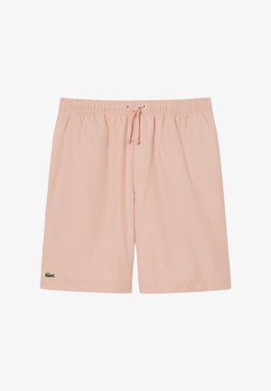 Short de bain pour hommes rose clair avec taille élastique, cordon de serrage ajustable et petit logo crocodile vert sur l'ourlet de la jambe gauche.