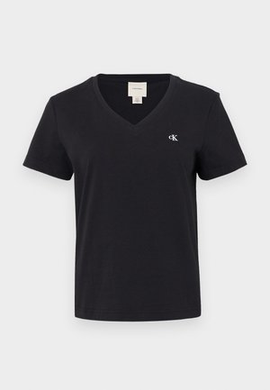 Zwarte katoenen V-hals T-shirt met korte mouwen, met een klein wit "ck" logo op de linkerborst. Eenvoudig, klassiek ontwerp.