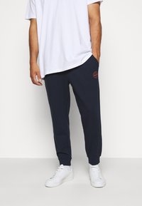 Jack & Jones GORDON SHARK PANT - Spodnji deli trenirk - navy blazer