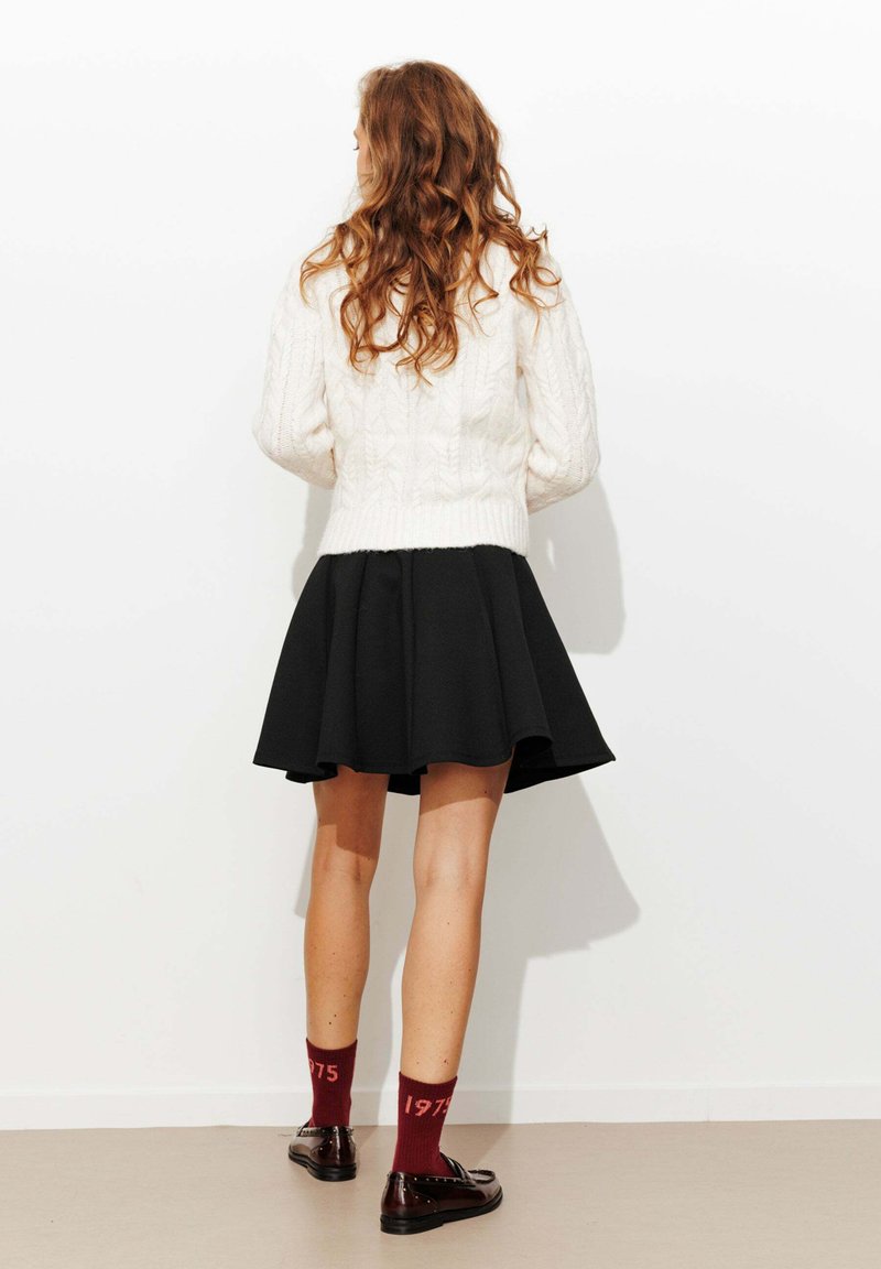 Fees Jupe Patineuse Courte Rétro Jupe Basique Noir Evasée Plissée