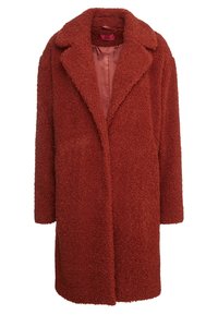 Nepvachtjas in diep roestkleur, met een notch-kraag en lange mouwen. Heeft een zachte textuur en een enkele knoopsluiting aan de voorkant.