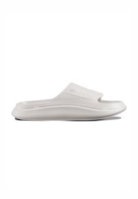 White slide sandal made of flexible material, featuring a smooth texture, cut-out for toes, and a slightly raised sole for comfort.