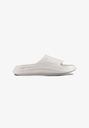 White slide sandal made of flexible material, featuring a smooth texture, cut-out for toes, and a slightly raised sole for comfort.
