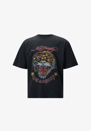 Camiseta de algodón negra con un gráfico colorido de un tigre y el texto "ED Hardy Los Ángeles", con un ajuste relajado y mangas cortas.