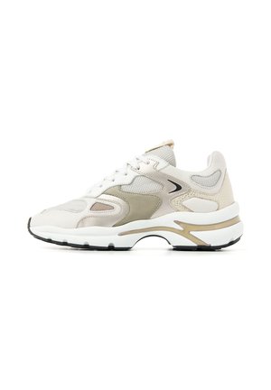 White and beige athletic sneaker with mesh and leather panels, thick cushioned sole, and black wave-shaped logo near the midfoot.