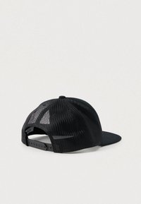 Black mesh snapback cap lying on its side showing adjustable strap and breathable back panels.