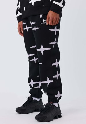 JOGGING ALL OVER POLARIS BRUSH - Pantalones deportivos - noir