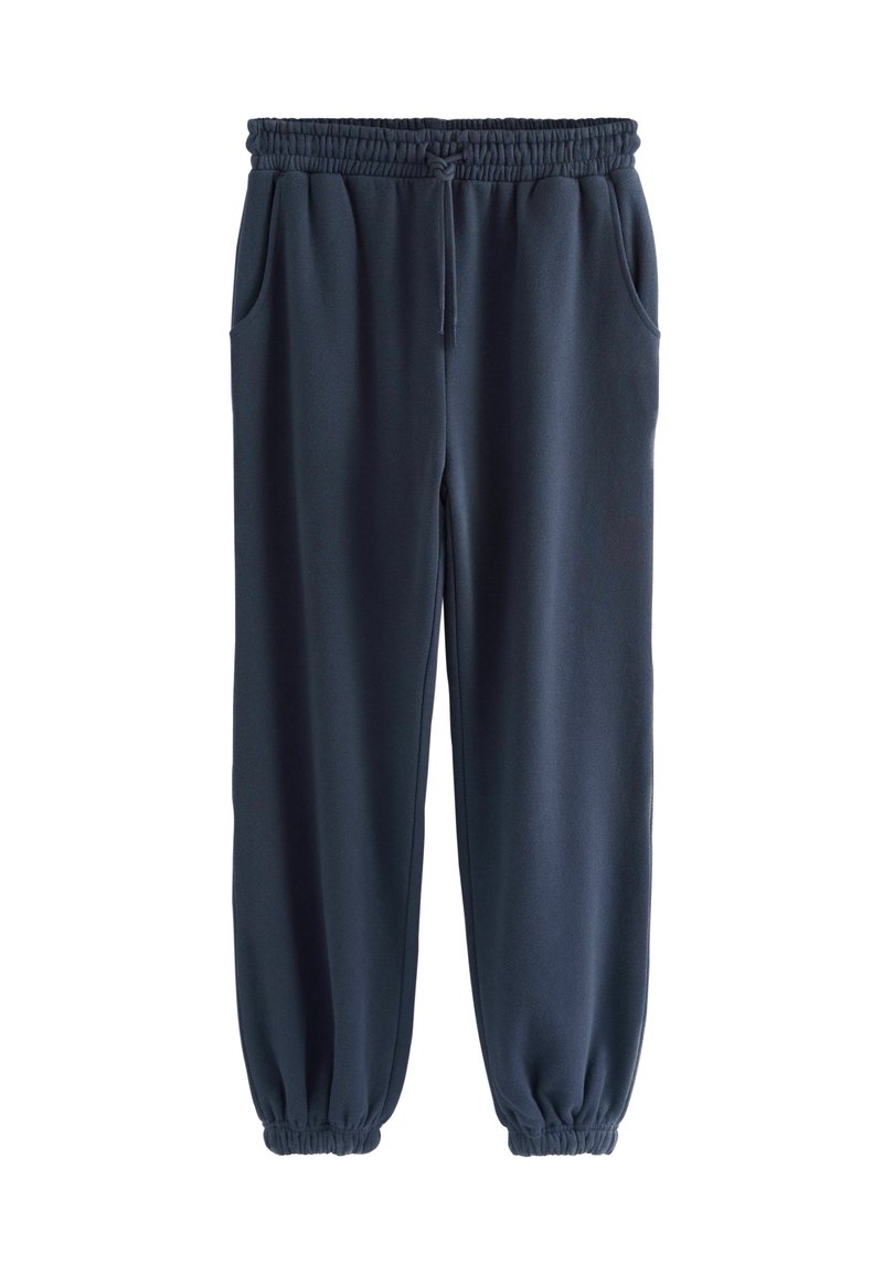 Dunkelblaue Sweatpants aus weichem Material, mit einem elastischen Bund und Kordelzug, seitlichen Taschen und elastischen Bündchen an den Knöcheln.