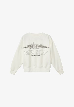 Cremefarbener Pullover mit gerippten Bündchen und Saum, der eine schwarze Umrissillustration der Skyline von New York und den Text "NEW YORK BIG APPLE SPIRIT" zeigt.