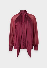 Μακρυμάνικο μπορντό μπλούζα με διαφανή μανίκια, σατινέ μπροστινή όψη, ψηλό λαιμό και δέσιμο φιόγκου στο γιακά.