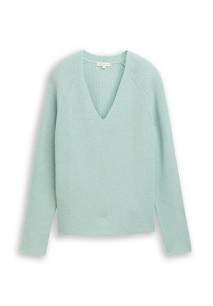 Pull en tricot vert menthe clair avec un col en V, des manches longues et une surface texturée. Il présente une coupe décontractée et des fentes latérales à l'ourlet.