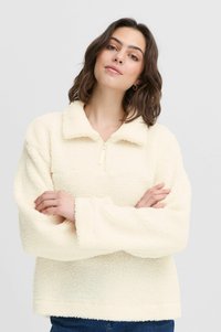 Cremefarvet fleece-pullover med halv-zip krave, lange ærmer og en tekstureret, fluffy overflade. Solid, lige sømdesign.