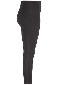 Leggings noirs en stretch avec une silhouette ajustée. Texture lisse et taille haute, allant jusqu'aux chevilles sans coutures ni motifs visibles.