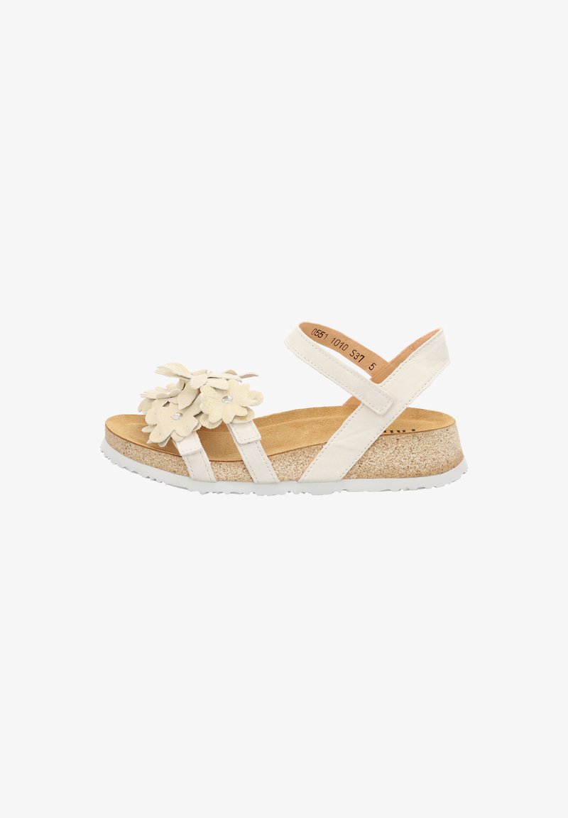 White sandal with floral accents, cork footbed, strap construction, and rubber sole. Features soft leather straps and a textured finish.