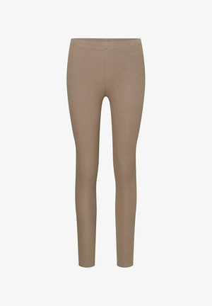 Beige ribbed leggings with a fitted design and elastic waistband, made from a soft, stretchy fabric. No visible patterns or hardware.