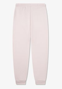 Απαλά ροζ φόρμες με ελαστική μέση, στενές μανσέτες και μαλακή, λεία υφή. Σχεδιασμένες για άνεση και χαλαρή εφαρμογή.