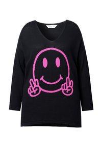 Maglione nero lavorato a maglia con un grande motivo di faccina sorridente rosa, due segni di pace, scollatura a V e maniche a tre quarti.