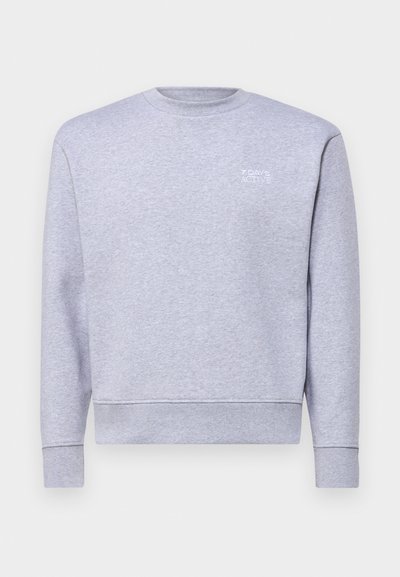 Sudadera gris clara hecha de forro polar, con un cuello redondo y puños acanalados. Logo bordado "7 DAYS ACTIVE" en el pecho.