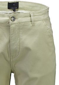 Beżowe spodnie z gładkiej bawełnianej tkaniny, zapięcie na guzik, szlufki na pasek oraz przeszycie na przedzie. Widoczna metka marki.