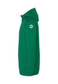 Green hooded jacket with a smooth texture, zippered pockets, elastic cuffs, and a circular logo on the left sleeve.
