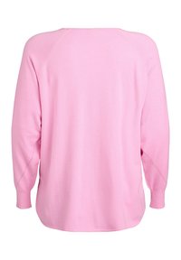 Różowa bluza z długimi rękawami raglanowymi, okrągłym dekoltem i miękką fakturą. Posiada zaokrąglony dół i widoczne szwy.