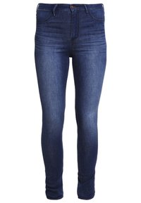Tmavě modré džíny typu skinny s hladkou texturou, středně vysokým pasem, pěti kapsami a malým kovovým zapínáním vpředu.