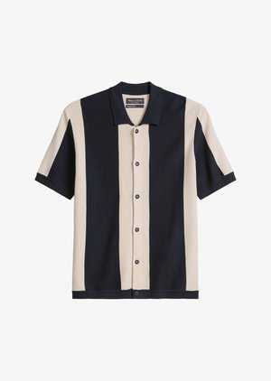 Πλεκτό πουκάμισο με κοντά μανίκια και κουμπιά, με κάθετες μαύρες και μπεζ ρίγες και μαύρο γιακά.