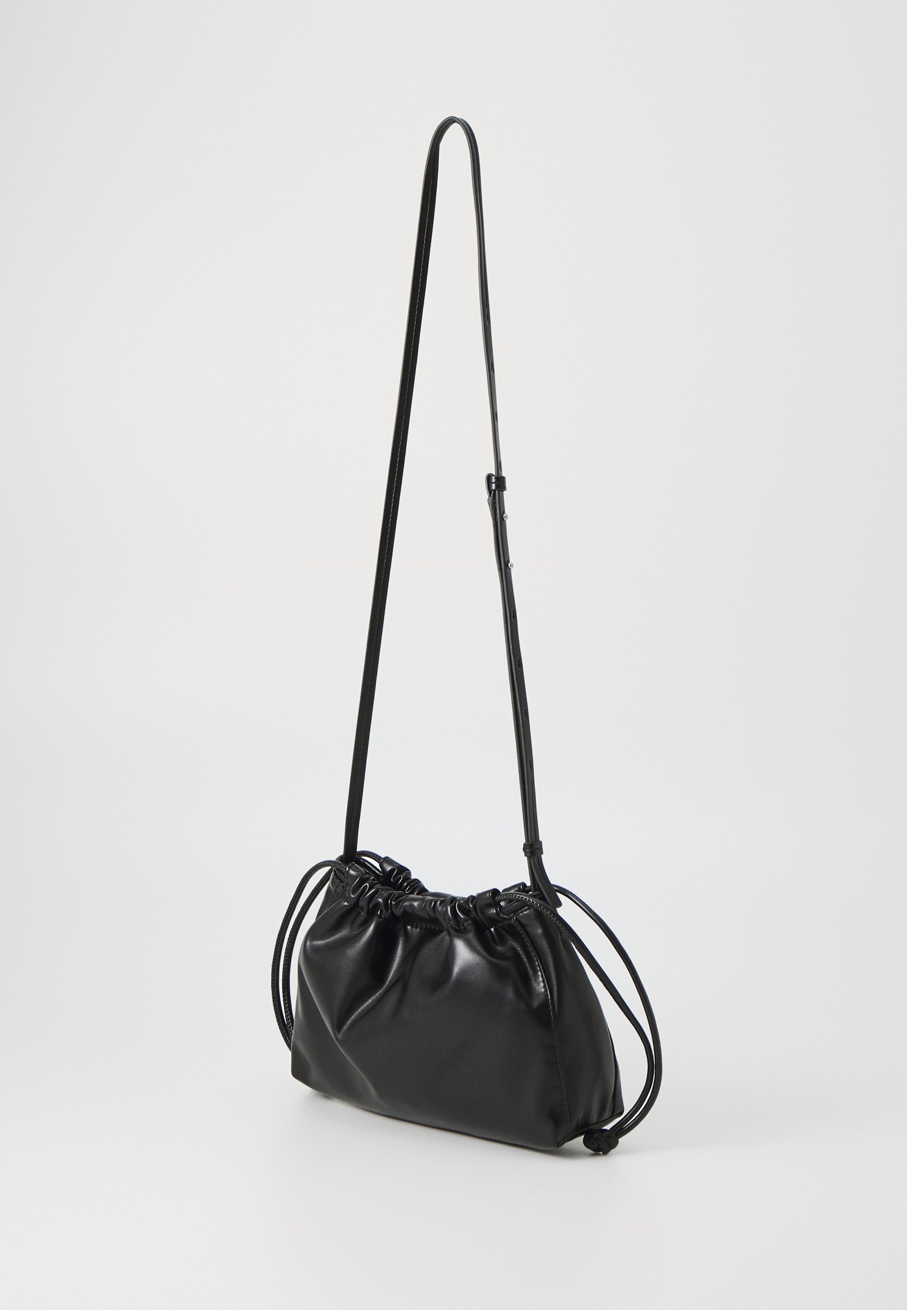 Calvin Klein Jeans DRAWSTRING BAG - Cross body bag - black