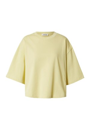 Lichtgeel oversized katoenen T-shirt met korte mouwen, ronde hals en wijde mouwen, met het label "EDITED" aan de binnenkant van de kraag.