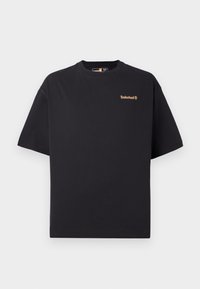 T-shirt noir à col rond et manches courtes de Timberland avec un petit logo beige sur le côté supérieur gauche de la poitrine, présenté sur un fond blanc.