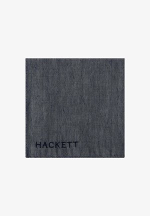 Navy sininen kangas herringbone-kuviolla, jossa on hienovarainen rakenne. Alareunassa on tummansinisesti brodeerattu brändinnimi "HACKETT".