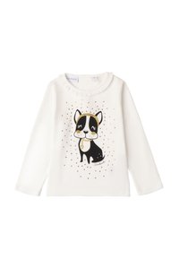 Weißes Langarmhemd mit einer schwarzen und goldenen Hundillustration und Verzierungen. Weicher Stoff mit Rüschenausschnitt und bedruckten Akzenten.